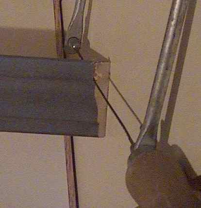 Photo of how to use a coping saw to cut and shape the end of molding.