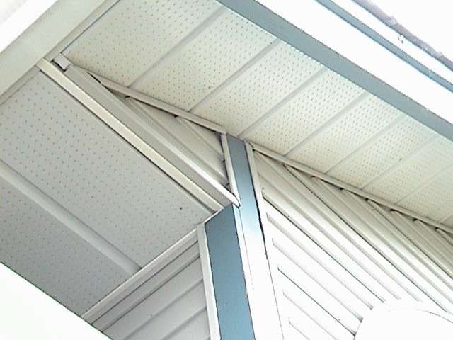 Photo of both soffit-at-rake and soffit-at-eave on a house.