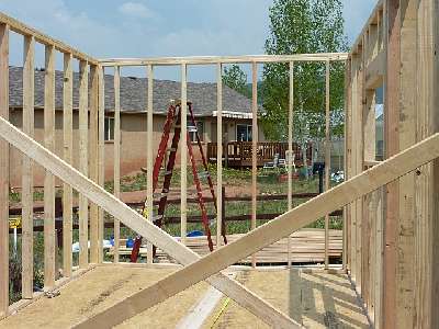 Photo of the walls of the gable shed framed and braced.