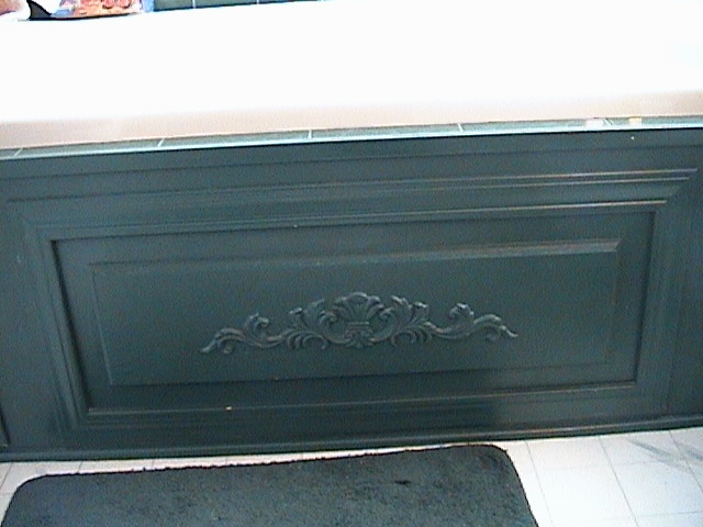 Photo of a panel on the jacuzzi bathtub enclosure.