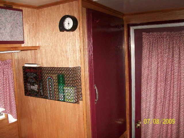 Photo of the outside of the shower and bathroom of the old camper after it was renovated.