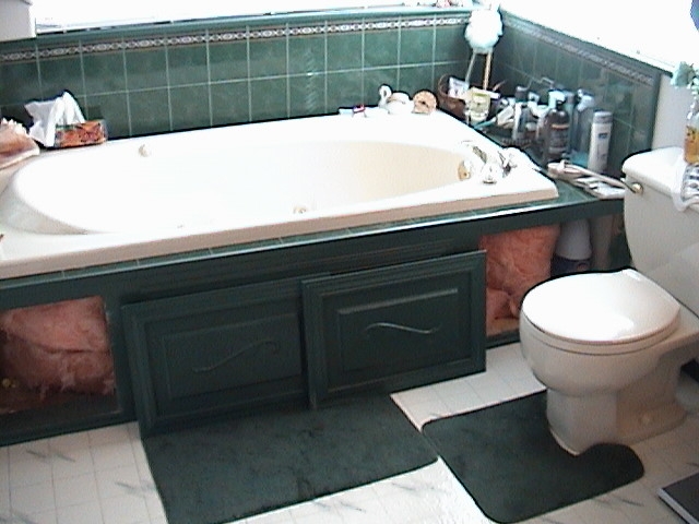 Photo of a jacuzzi bathtub showing insulation around tub.
